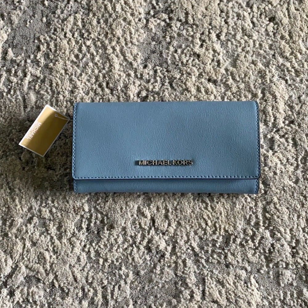 Michael Kors light blue wallet. Never used.